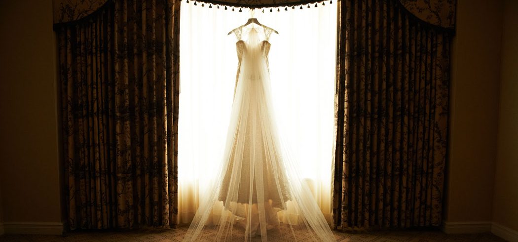 Wedding dress in window in Philadelphia, PA - Event Planner