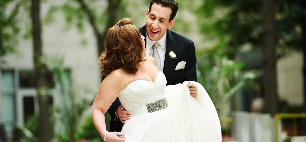 Bride and Groom smiling during first look outside wedding portraits in Philadelphia, PA - Event Planner