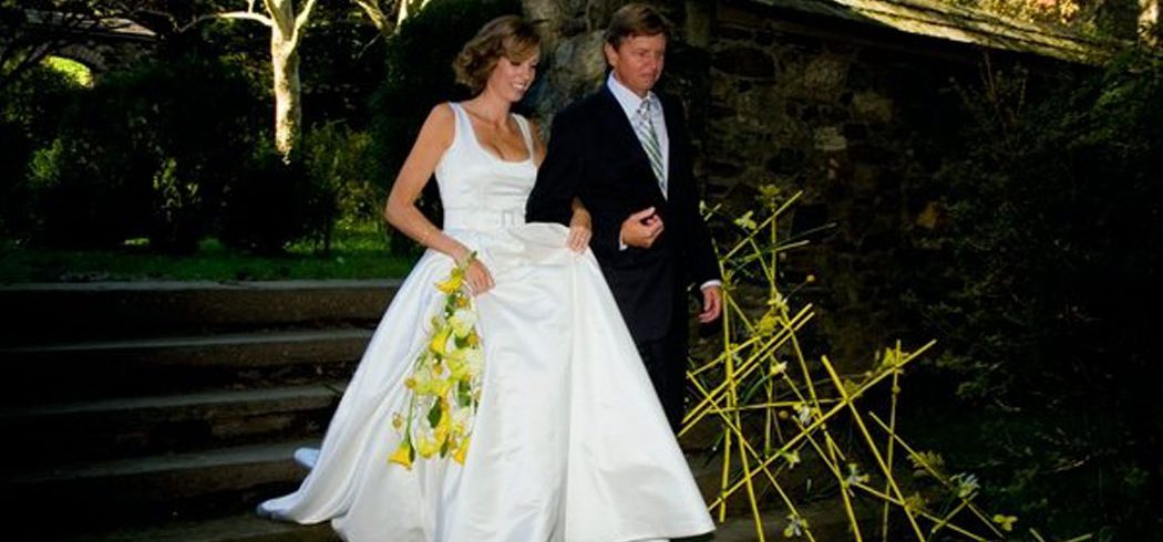 Bride and Father walk down aisle during wedding ceremony in Philadelphia, PA - Event Planner