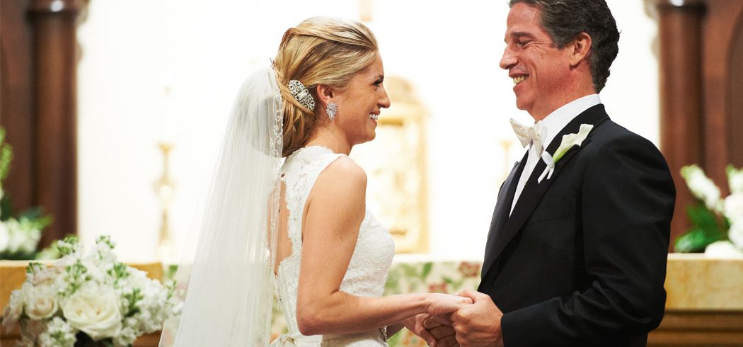 Bride and Groom laugh during vows at wedding in Philadelphia, PA - Event Planner