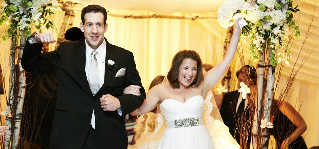 Bride and Groom walk down aisle after Jewish wedding ceremony in Philadelphia, PA - Event Planner