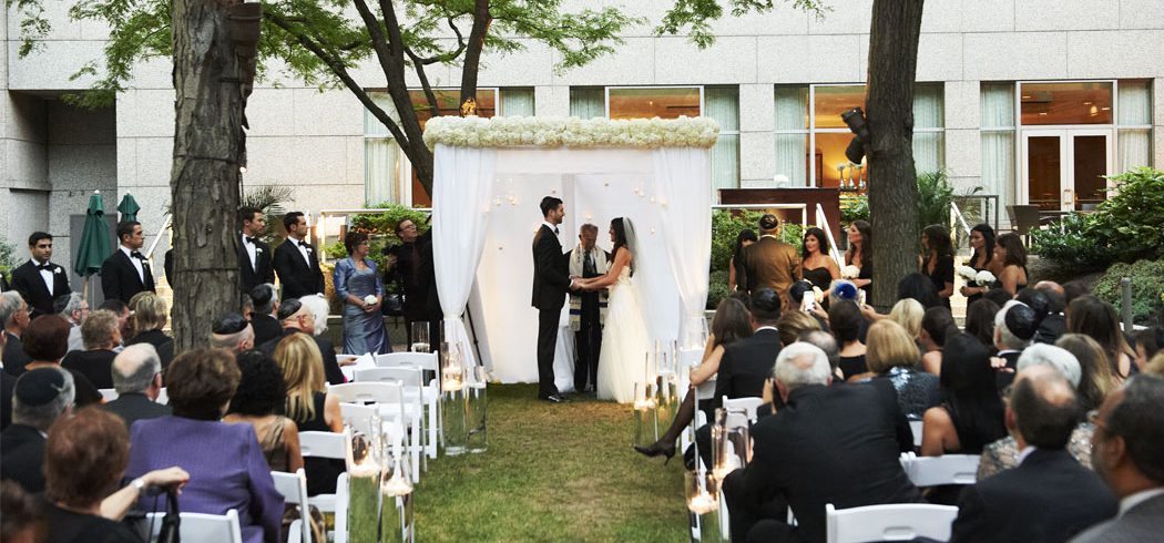 Bride and Groom exchange vows at outdoor Jewish wedding ceremony in Philadelphia, PA - Event Planning